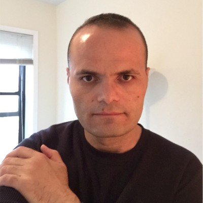 Headshot of Andi Shehu